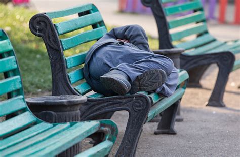 Sleeping Homeless Man On A Bench Stock Photo Download Image Now Istock