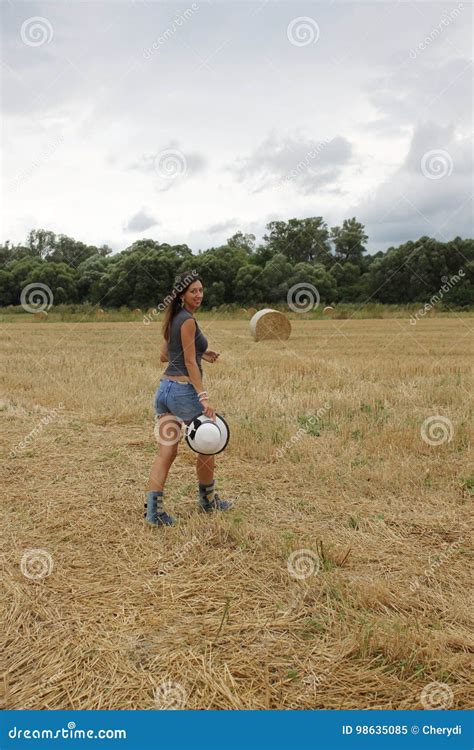 A Beautiful Young Woman Is Posing In The Field Stock Image Image Of