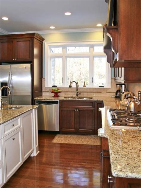 Pictures of yellow kitchen with cherry cabinets and black counters | baltic brown kitchen cherry kitchen cabinets design ideas, pictures, remodel and decor love the idea of cherry cabinets with black granite counters. Cherry Kitchen Cabinets With Gray Wall And Quartz ...