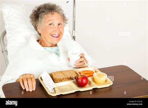 Senior Hospital Patient Eating Her Lunch On A Tray Stock Photo Alamy