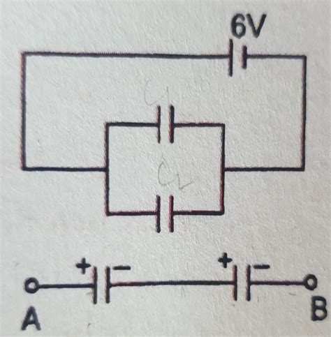 Two Identical Parallel Plate Capacitors Are Connected In Parallel And Joined To A 6v Battery