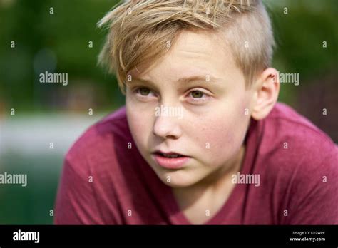 Close Up Of Concentrated Teenager Boy In Nature German Ethnicity In