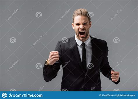 Irritated Businessman Screaming And Showing Clenched Stock Photo