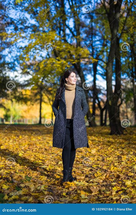 Young Woman Walking In Autumn Park Stock Photo Image Of Beautiful