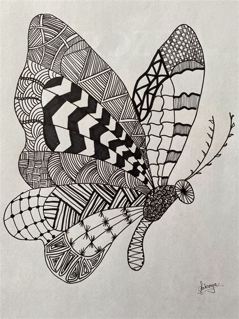 A Black And White Drawing Of A Butterfly With Geometric Designs On Its