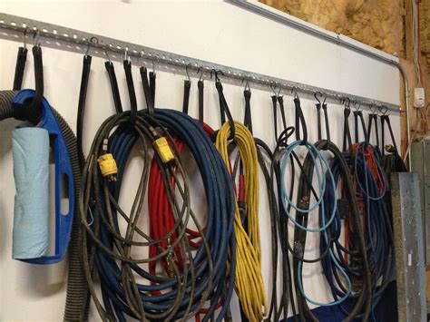 This Is A Great Way To Store Extension Cords And Hoses Screw A Piece