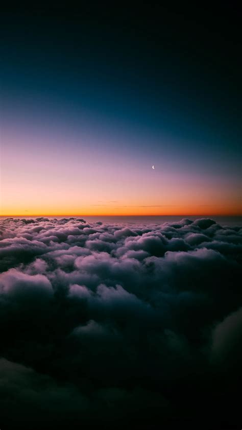 Download Wallpaper 938x1668 Clouds Porous Sunset Sky Horizon
