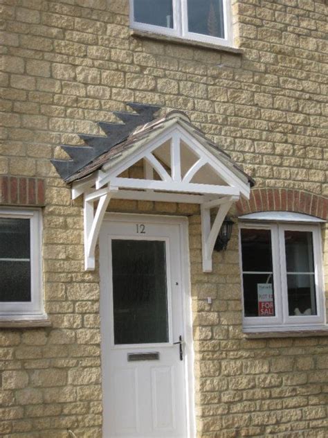 Traditionally crafted and secure, these doors like these are instantly desirable for a conventionally structured home. Front Door Canopy Porches Wooden Roof Kit Traditional ...