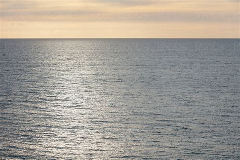 View Of Vast Ocean Horizon And Sky At Dawn By Stocksy Contributor