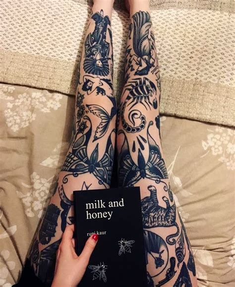 gorgeously tattooed legs on a lady named katie reading the well known book of poetry mi