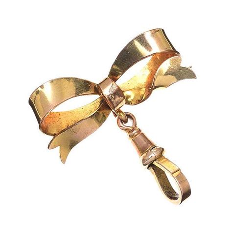 CT GOLD BOW BROOCH