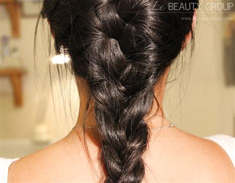 Starting at the front of your hair you begin the braiding process by gathering three lengths of hair. Hairstyle: Messy French Plait / Braid on Layered Hair
