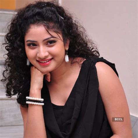 Vishnu Priya Sizzles In A Black Dress While She Poses During A Photoshoot