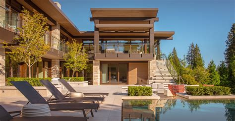 Modern dream home backyard stone veneer landscaping pavers patio pool Buechel Stone