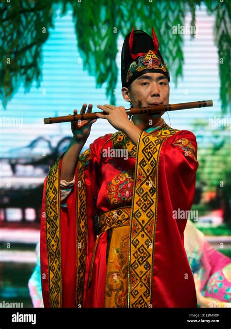 Musician Playing Flute During A Traditional Tang Dynasty Chinese Opera
