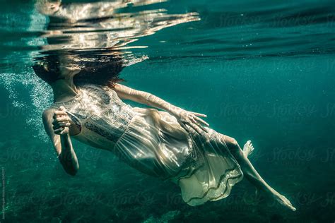 Underwater Photo Of Beautiful Woman Swimming In Boho Dress Del