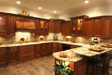 Dark gray kitchen cabinets also match the cabinets on the island and complement the look on the kitchen. Cherry Glazed Kitchen Cabinets | RTA Cabinet Store