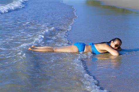 Woman And Bikini Blue Sleep Relax With Wave At Beach Stock Image Image Of Bikini Body 150879185