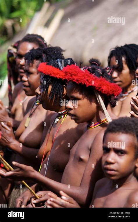 Papua Traditionnal Show From A Real Dani Tribe At Jiwika Village In Baliem Valley Occidental