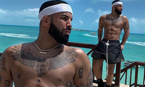 Drake Shows Off His Sculpted Abs As He Goes Shirtless In Fear Of God X Nike Shorts While On Vacation