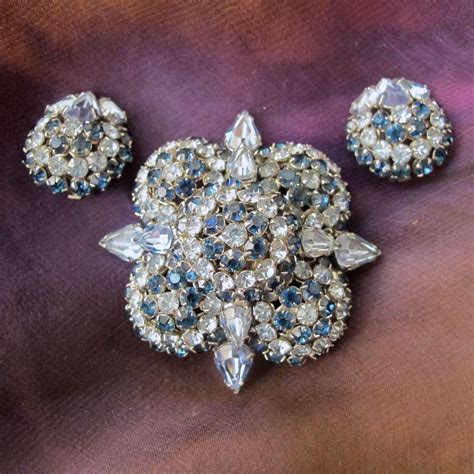 Vintage Warner Blue Rhinestone Flower Brooch And Earring Set From