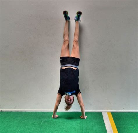How To Do A Handstand Redefining Strength Handstand Redefining