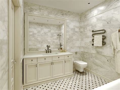 White bathroom floor tiles with small black insets can effectively ground the floor space, keeping it distinct from white walls. Carrara Marble Tile White Bathroom Design Ideas - Modern ...