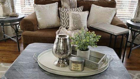 If you're styling a round coffee table and you want a simple, arranged look, try dividing your table into thirds or quadrants. Coffee Table Decorating Ideas (many different styles ...