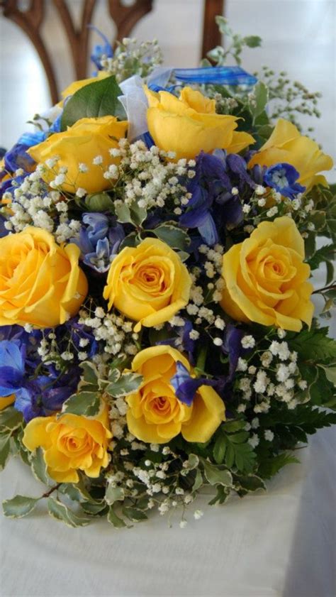 Coral rose and succulent wedding bouquet for a celebration in cincinnati, ohio | i do weddings with love. Blue and yellow wedding bouquet | Yellow wedding bouquet ...