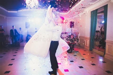 Beautiful Caucasian Wedding Couple Just Married And Dancing Their First
