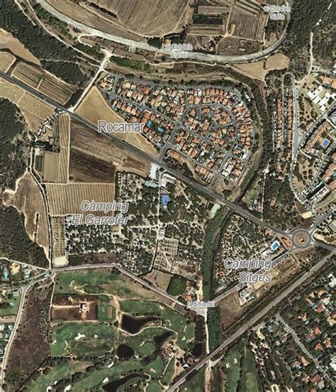 Aerial map overlays showing Riera de Ribes Rocamar changes since 1945