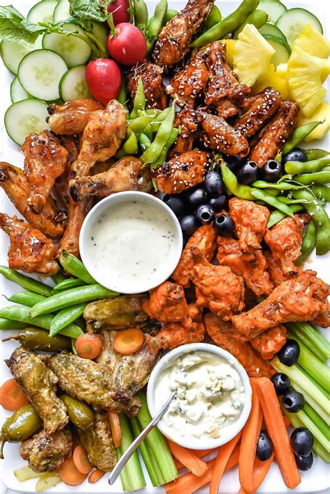 Healthier crispy baked chicken wings are dressed in four ...