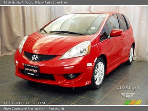 The kia soul is closest with 53. Milano Red - 2010 Honda Fit Sport - Sport Black Interior ...