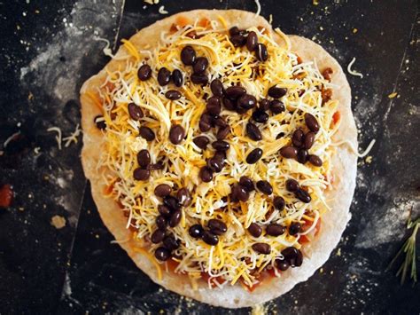 It's the latest application of doritos corn chips: Nacho pizza - sprinkle with crushed Doritos for added ...