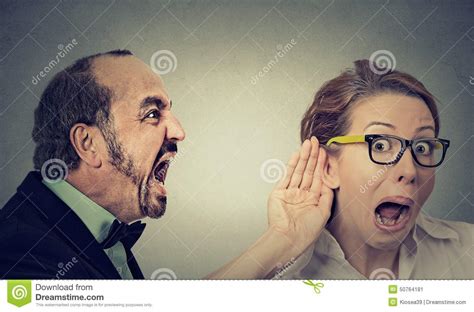 Angry Man Screaming Curious Woman With Hand To Ear Gesture Listens