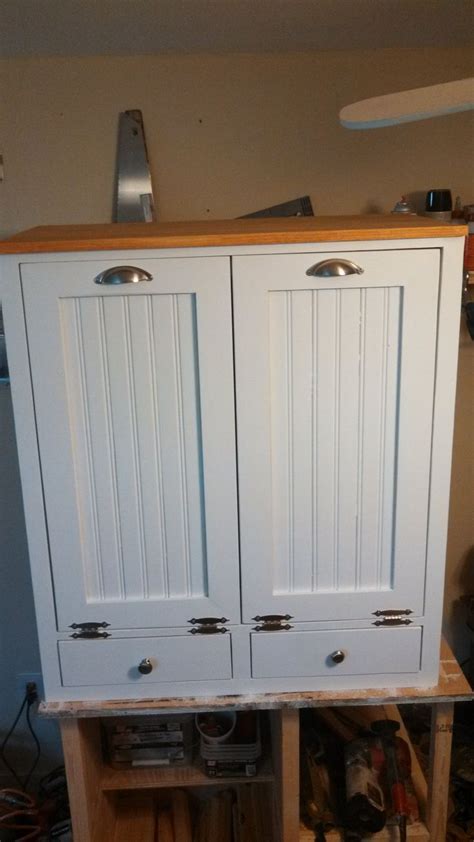 This will ensure the refinished cabinets look like new when you're done. double garbage can cabinet - Home Decor