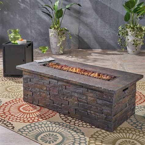 The lava rocks add a nice touch to this geometrically pleasing concrete block fire pit.we're not the owner of this website, best outdoor fire pits, is a participant in the amazon services llc associates. Corrigan Studio® Ritchie Outdoor Concrete Propane Fire Pit & Reviews | Wayfair