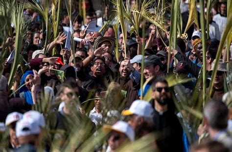 Thousands Flock To Jerusalem For Palm Sunday Procession