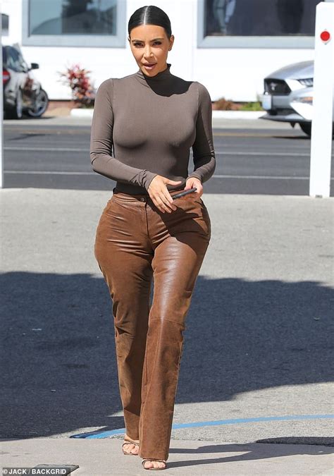 Kim Kardashian Displays Her Curves In Leather Trousers And Taupe Turtleneck Daily Mail Online