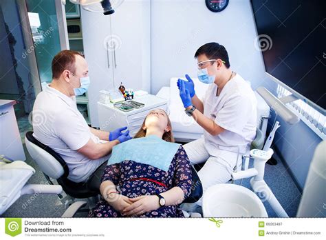 Dentist Treats Teeth Stock Image Image Of Blue Treatment 66063487