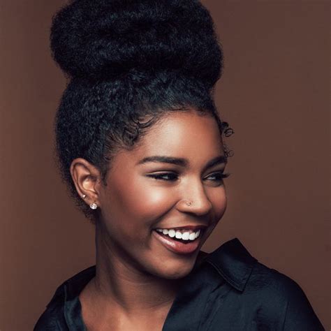 In case you love the playful hairstyle and are planning on going out with friends, you can gather your natural hair into double buns. 5 Natural Hairstyles Perfect For Work - TGIN
