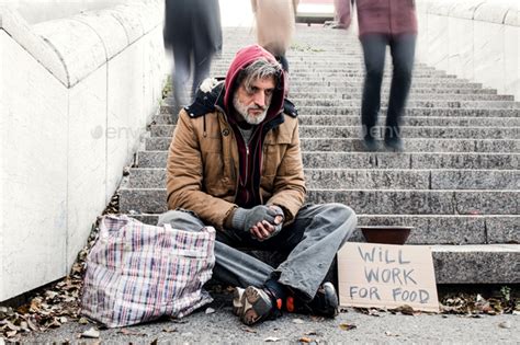 Homeless Beggar Man Sitting Outdoors In City Asking For Money Donation Stock Image Everypixel