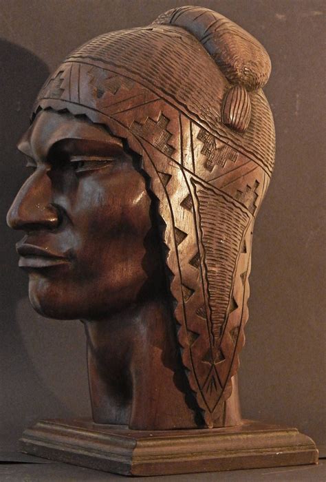 peruvian-male-in-traditional-headdress,-art-deco-sculpture-headdress-art,-art-deco-sculpture
