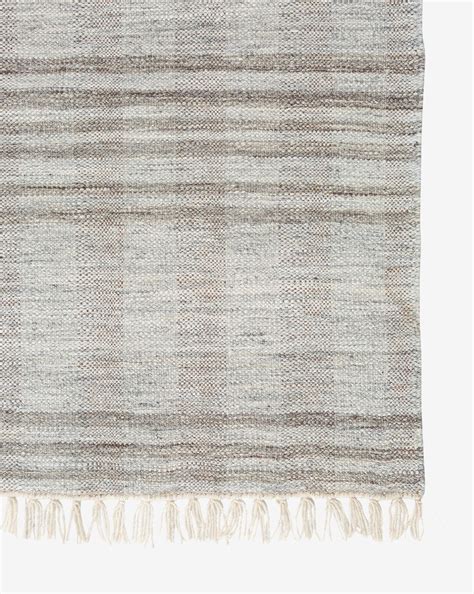 With A Simple Palette The Lochlyn Handwoven Rug Holds A Remarkable