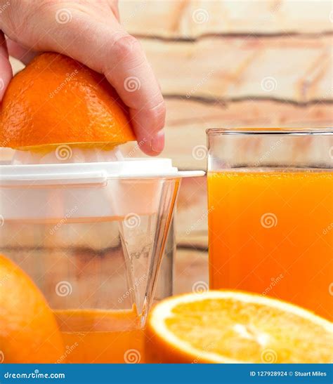Freshly Squeezed Orange Shows Healthy Eating And Beverage Stock Photo