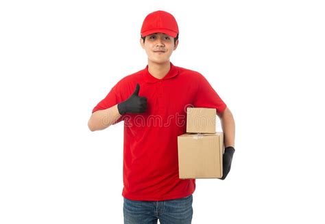 young delivery man  red uniform holding paper cardboard box  tablet computer mockup