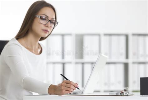 Serious Businesswoman Wearing Glasses Taking Notes Her Clipboard Stock