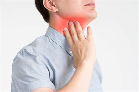 Sore Throat Men With Pain In Neck Gray Background Stock Photo