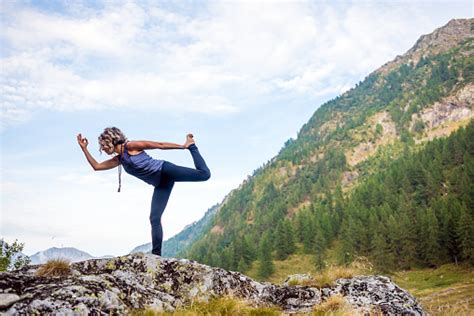 Yoga Exercises In Nature Dancer Pose Stock Photo Download Image Now