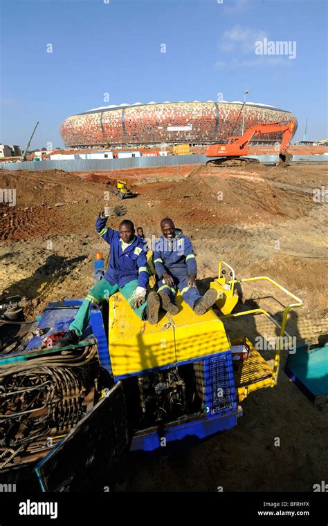 Two Construction Workers At Soccer City Stadium In South Africa Venue For 2010 Fifa World Cup